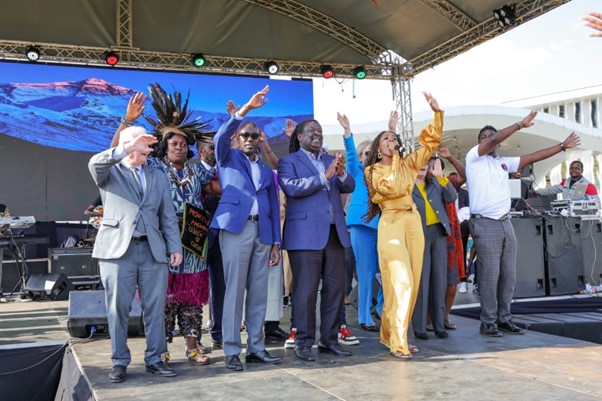 Prime Cabinet Secretary Dr. Musalia Mudavadi and PS Korir Sing’oei join artists on stage during the Harmony 4Haiti Concert and Cultural Festivals in August 2024.