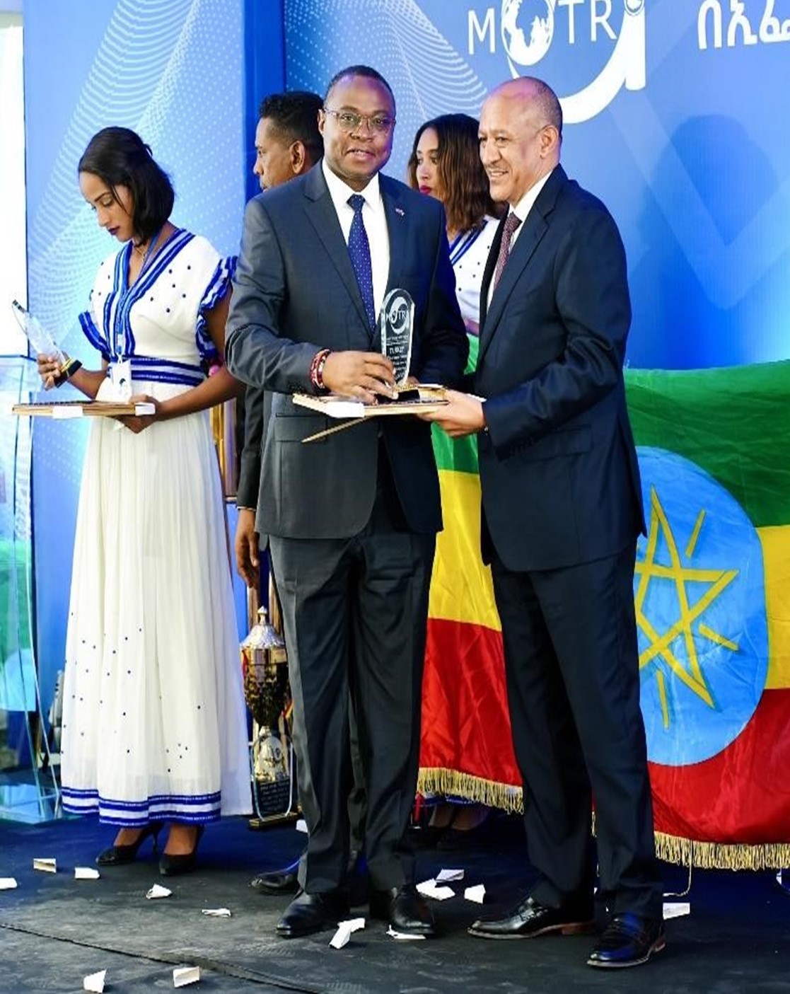 Ambassador George M. Orina, Ambassador/ Permanent Representative receive an award from Hon. Temesgen Tiruneh, the Deputy Prime Minister of the Federal Democratic Republic of Ethiopia.