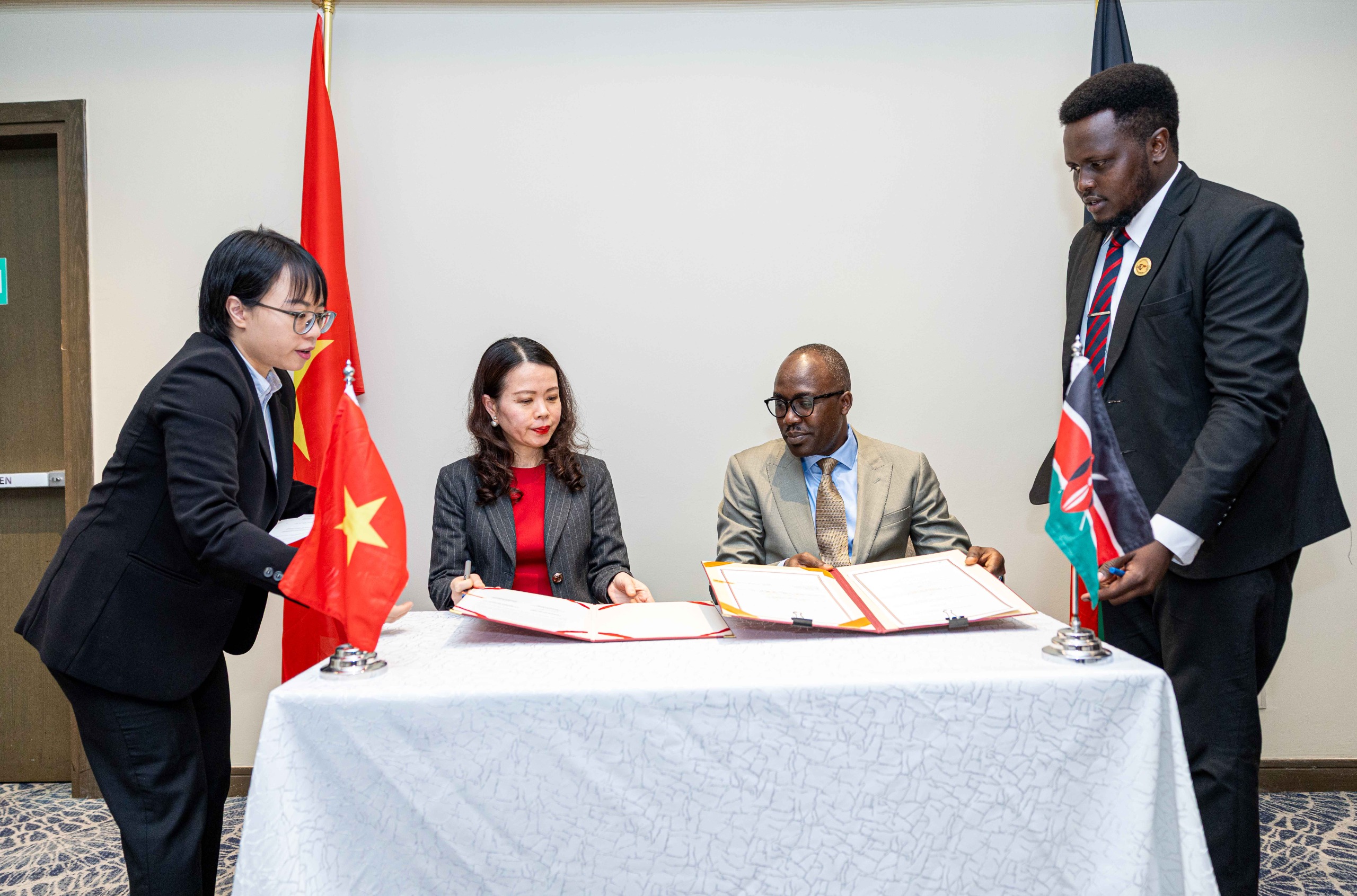 Dr. Korir SingOei and Special Envoy H. E. Madame Nguyen Minh Hang during the signing of the Memorandum of Understanding on Political Cooperation. 