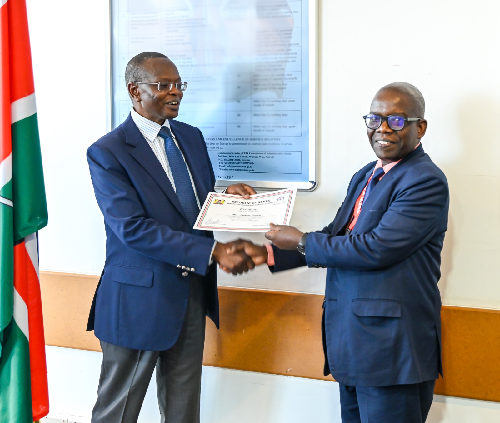 Receiving certificate of induction training.