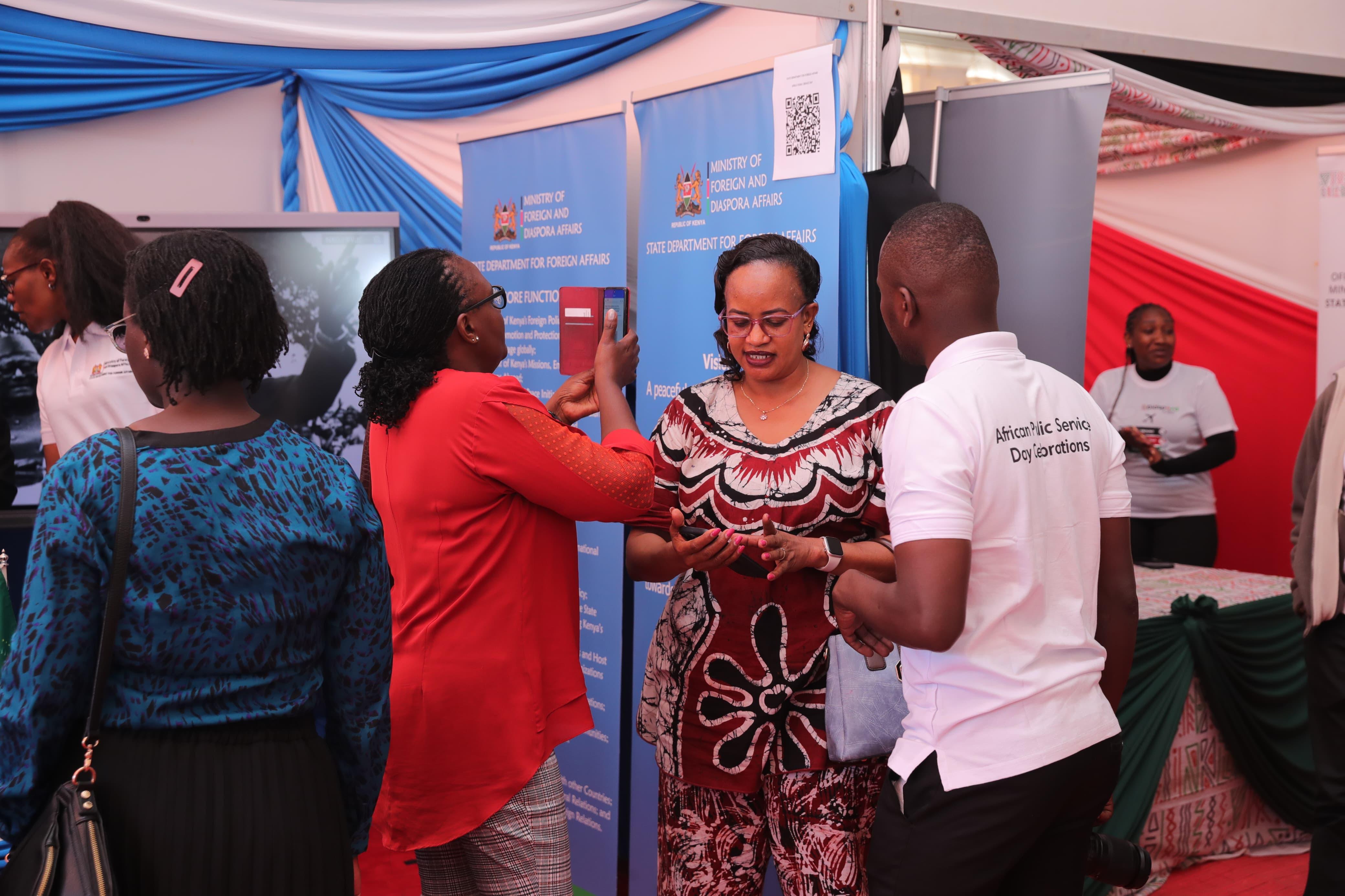 SDFA staff engaging with the public at the booth