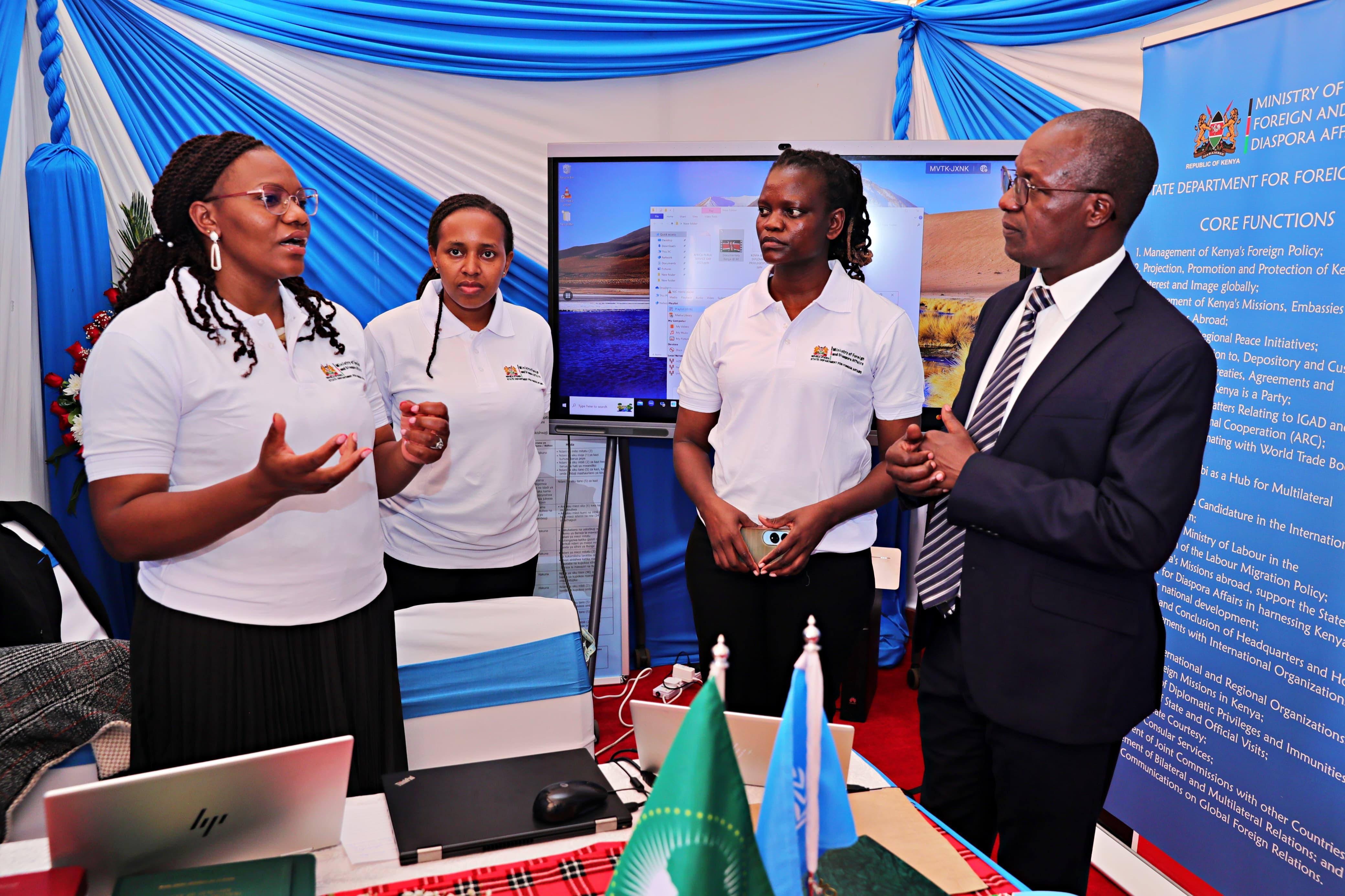 Amb. Michael Kiboino, Secretary for Foreign Service Administration, visits the SDFA booth 