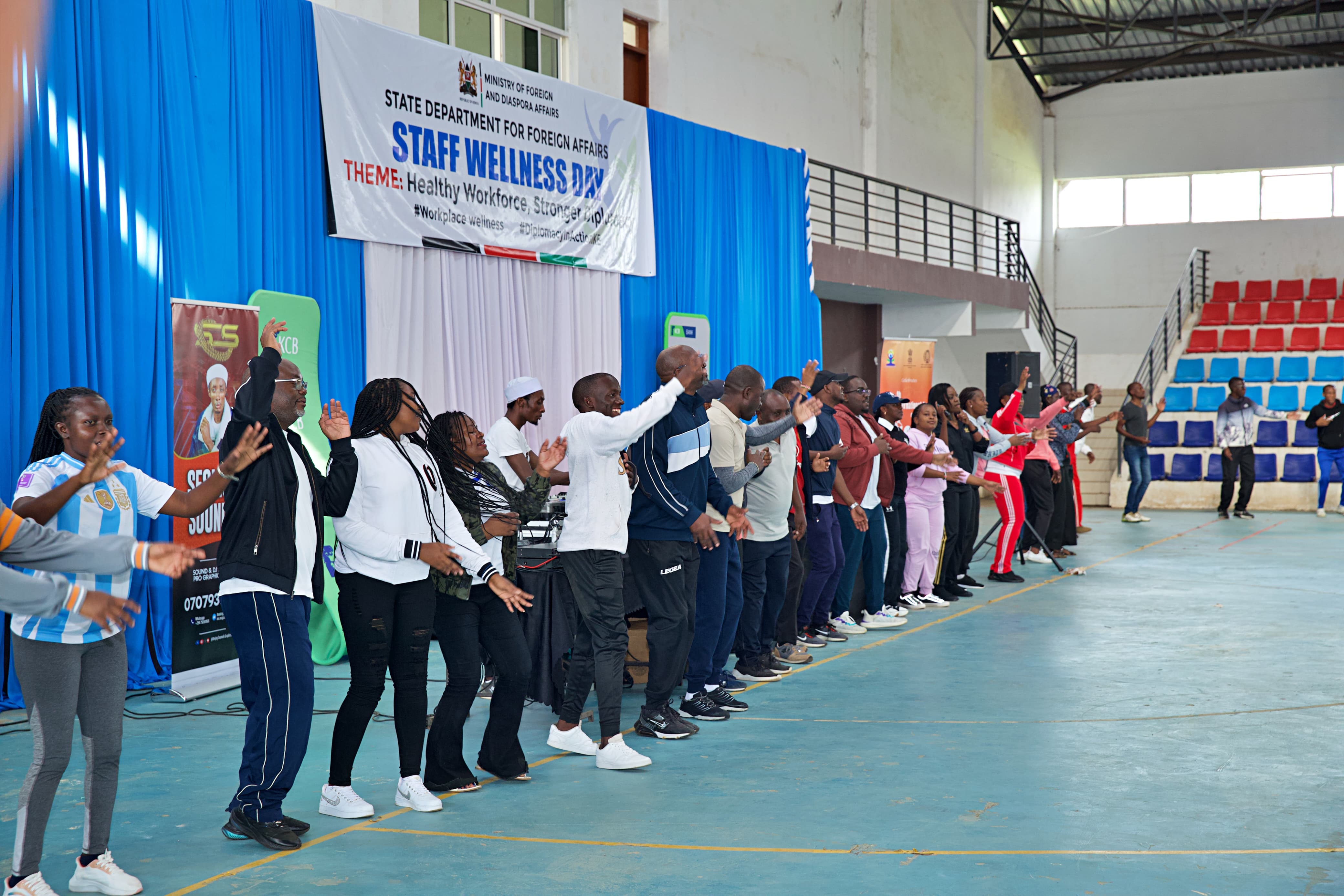 Staff participating in warm up session