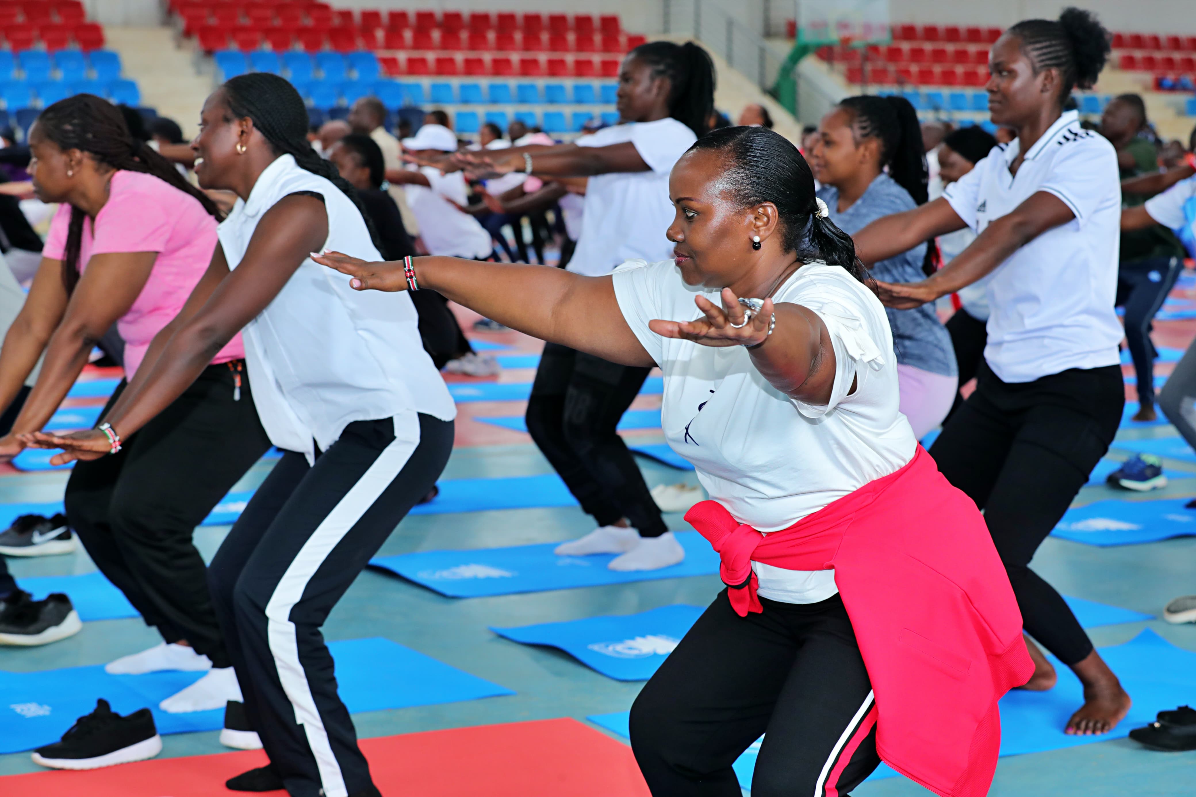 Staff participating in yoga session